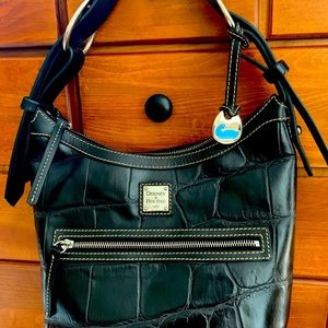 Like new Dooney and Bourke bucket handbag . Perfect shape .